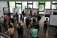 Exhibition spaces with TELOS curriculum and competition posters